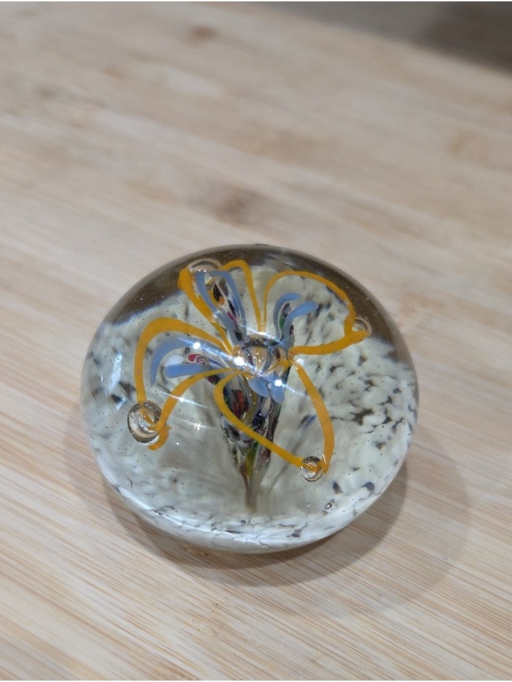 Clear Glass Paperweight with Yellow Floral Swirl